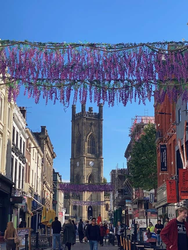 bold street in liverpool with decoration and st lukes bombed out church at the top